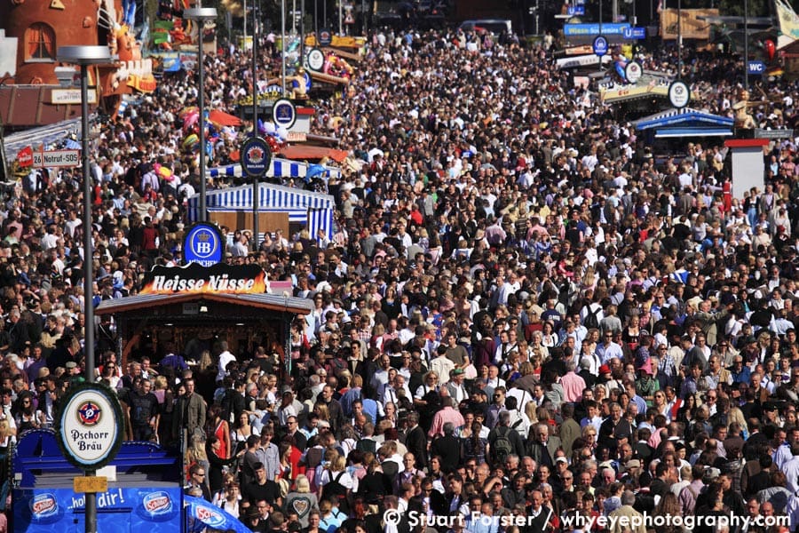 People on the Theresienwiesen during a busy day at the Oktoberfest in Munich, Germany