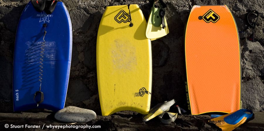 Brightly coloured body boards used by surfers on Tenerife