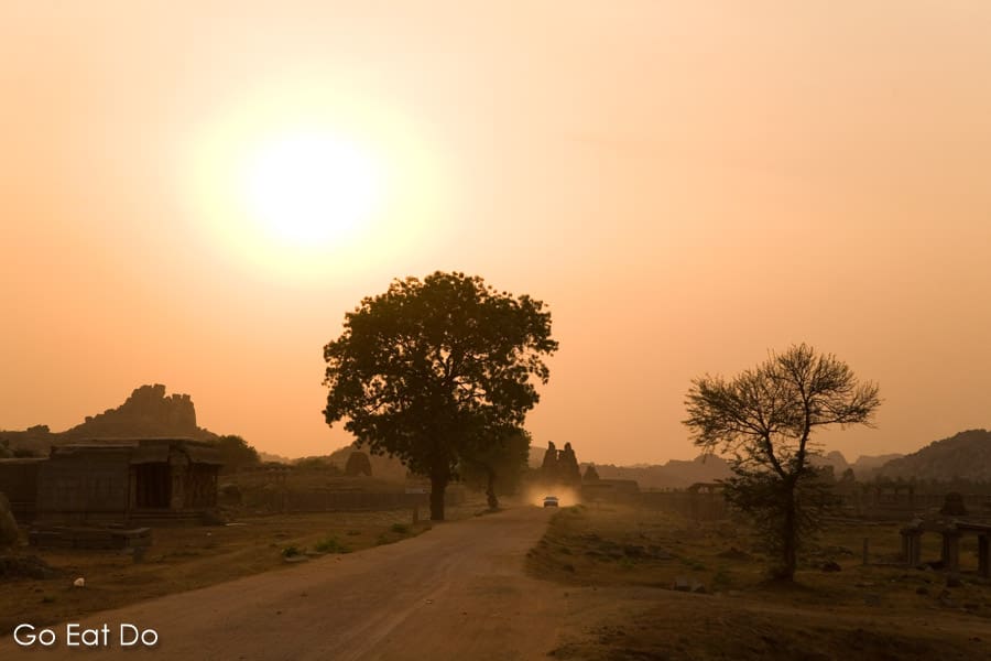 Sunset over Hampi, one of the destinations visited during a tour of southern India on the Golden Chariot