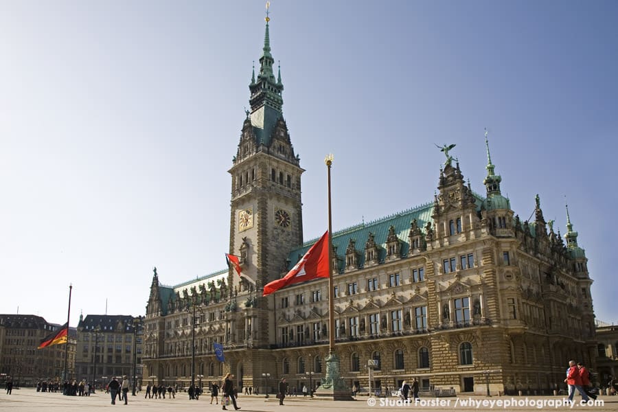Facade of the Rathaus, the Gothic-style town hall, on a sunny day in Hamburg, Germany