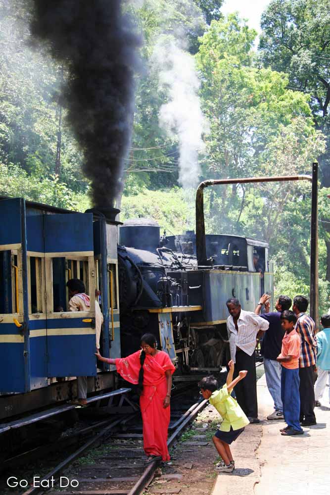 Smoke bellows from the X Class locomotive drawing the Nilgiri Mountain Railway on its way between Mettupalayam and Coonoor in southern India