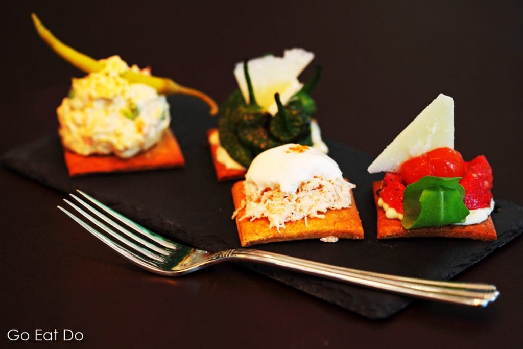 Selection of Pinchos (bite sized tapas served on freshly cooked bread) at the Ibérica La Terraza Spanish restaurant in London