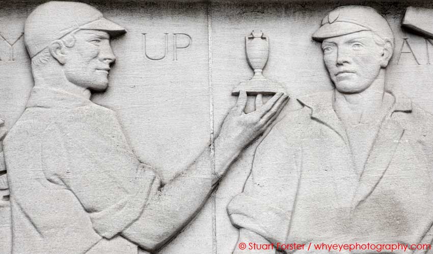 Frieze depicting cricketers with The Ashes urn, for which England and Australia compete, outside Lord's Cricket Ground in London, England