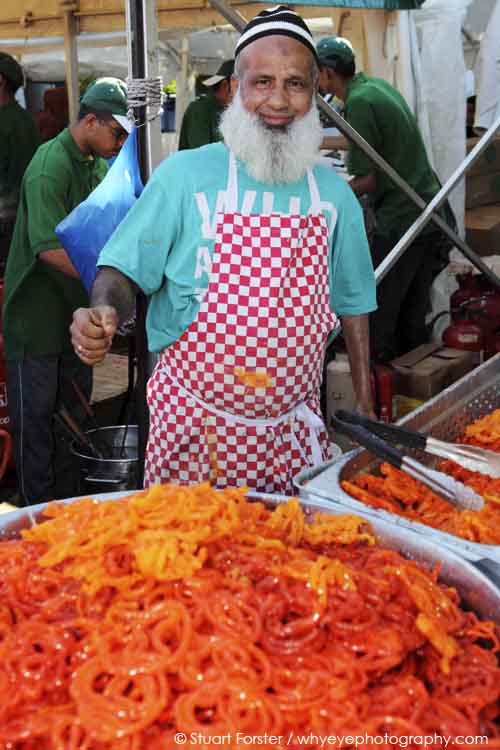 A man prepares jalebi at Newcastle Mela in Newcastle-upon-Tyne. Photo by Stuart Forster.