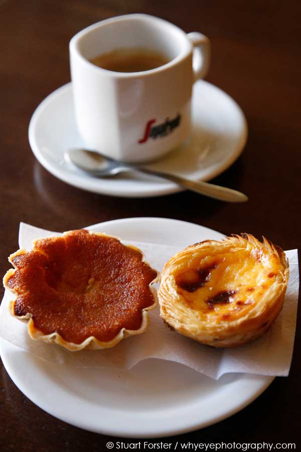 Traditional bica coffee and cakes served at a cafe in Lisbon, Portugal
