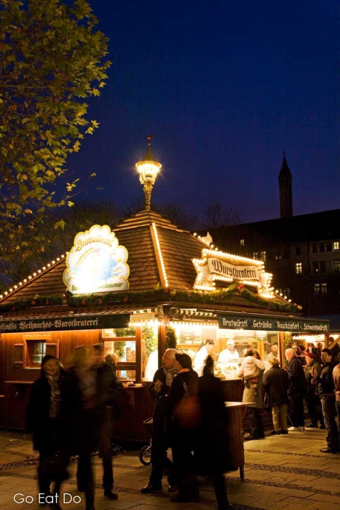 Stalls selling traditional food and drink at one of the Christmas markets in Munich, Germany.