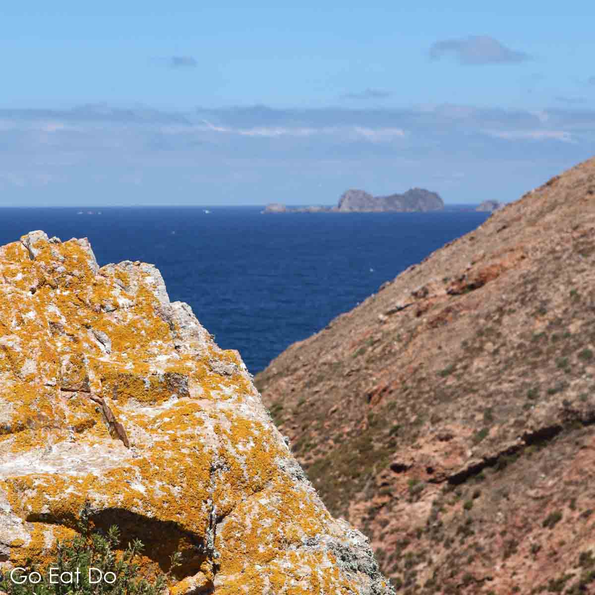 Lichen covered rocks on the Berlengas Islands in the Atlantic Ocean.