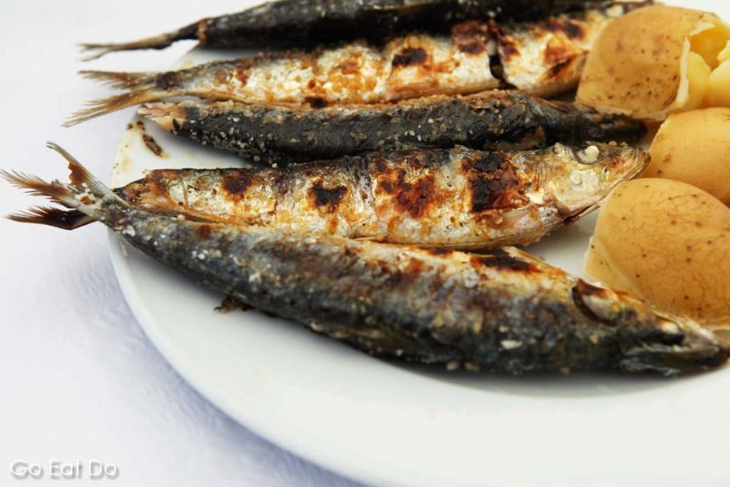 Grilled sardines, a traditional Portuguese delicacy, served at a restaurant in Peniche
