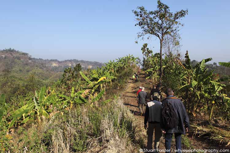 Tourists trekking in the Bandarban Hills of Bangladesh, a region with mosquitoes transmitting malaria