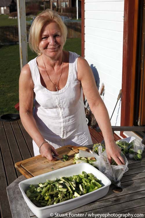 Merrit chopping vegetables at Home Restaurant MerMer in Estonia. Photo by Stuart Forster.