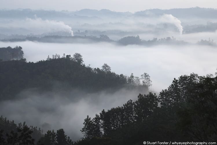 Early morning mist and smoke over forest in the Bandarban Hills of Bangladesh