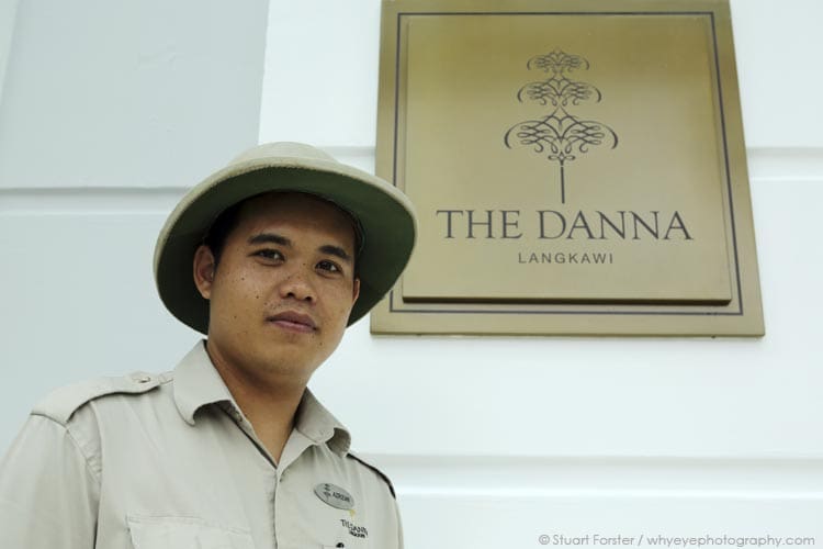 Doorman in a pith helmet at the lobby of the Danna hotel on Langkawi, Malaysia