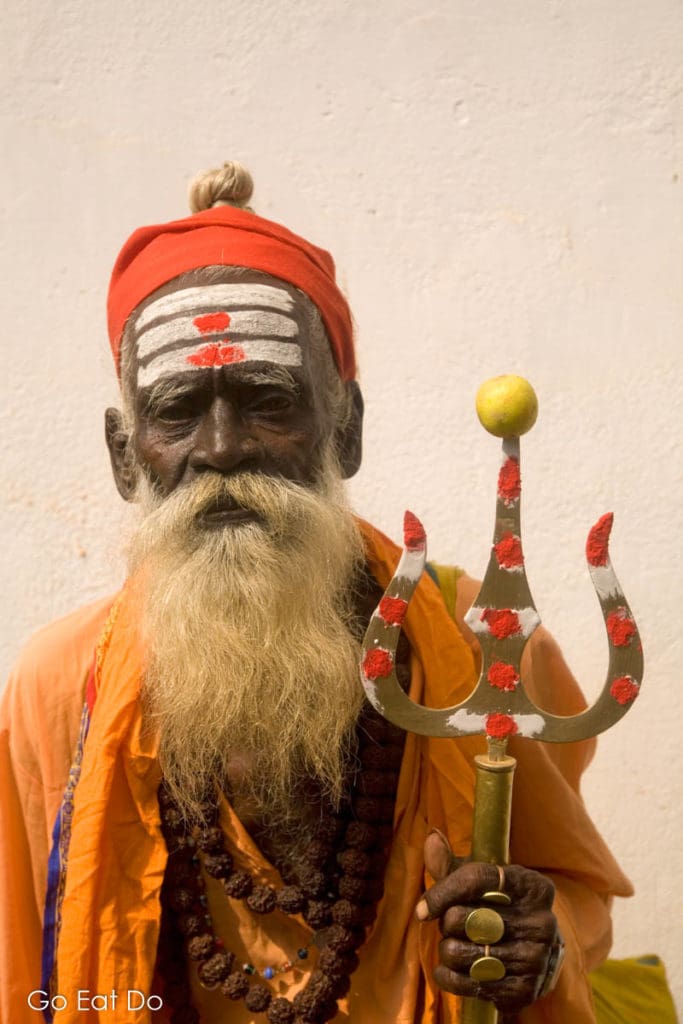 A Shaivite sadhu carrying a trident in Fort Kochi, Kerala.