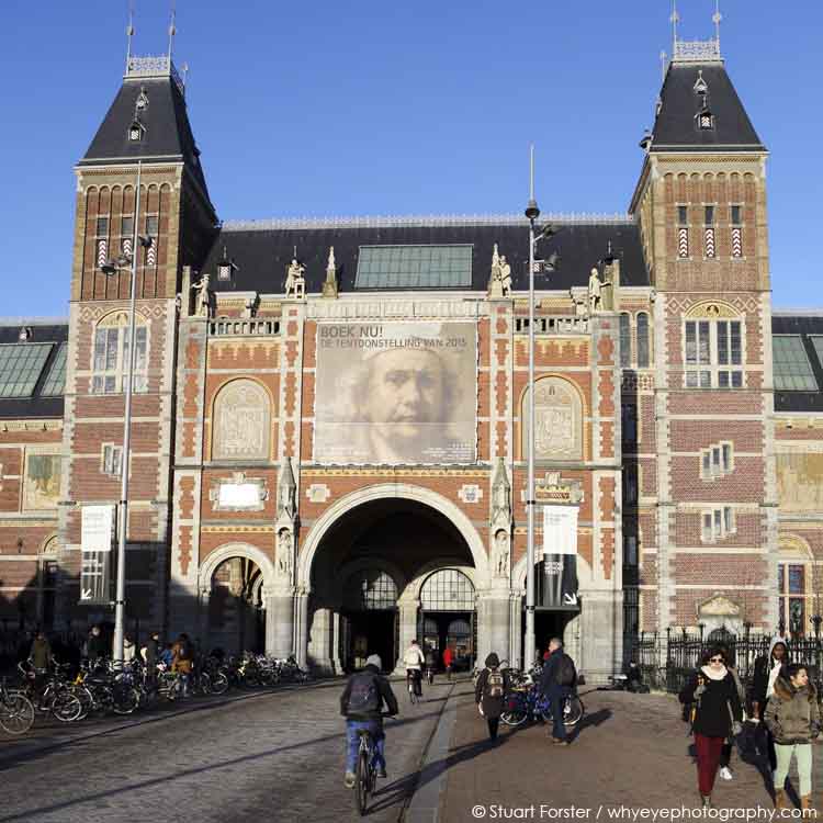 Artist Rembrandt van Rijn's face looking out from the Rijksmuseum in Amsterdam, the Netherlands