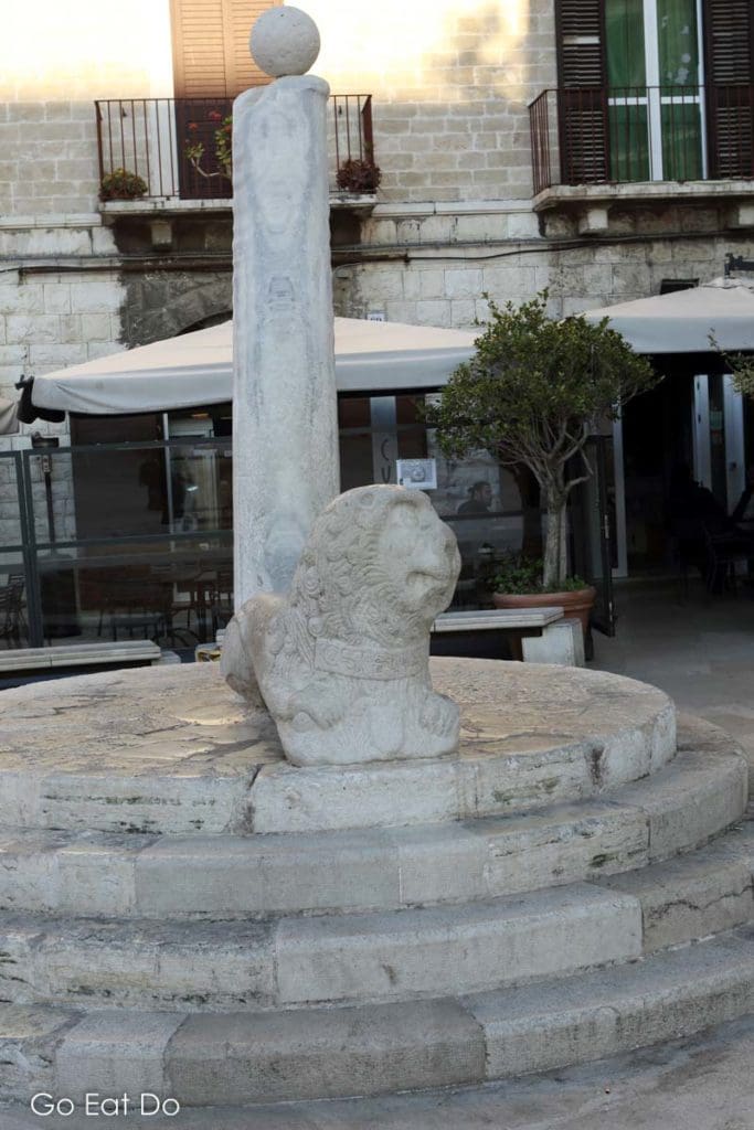 Pillory with a medieval lion sculpture at the Colonna della Giustizia, Bari's column of justice, at the Piazza Mercantile in the heart of Bari Vecchia.