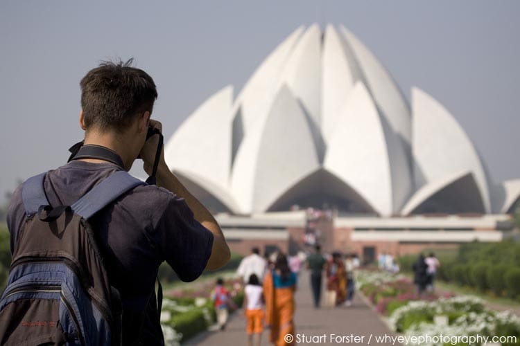 A man photographs at the Baha'i House of Worship (Lotus Temple), one of the best known landmarks of New Delhi, India