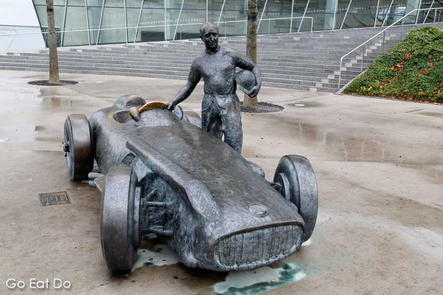 Statue of racing driver Juan Manuel Fangio outside of the Mercedes-Benz Museum, in Stuttgart, Germany
