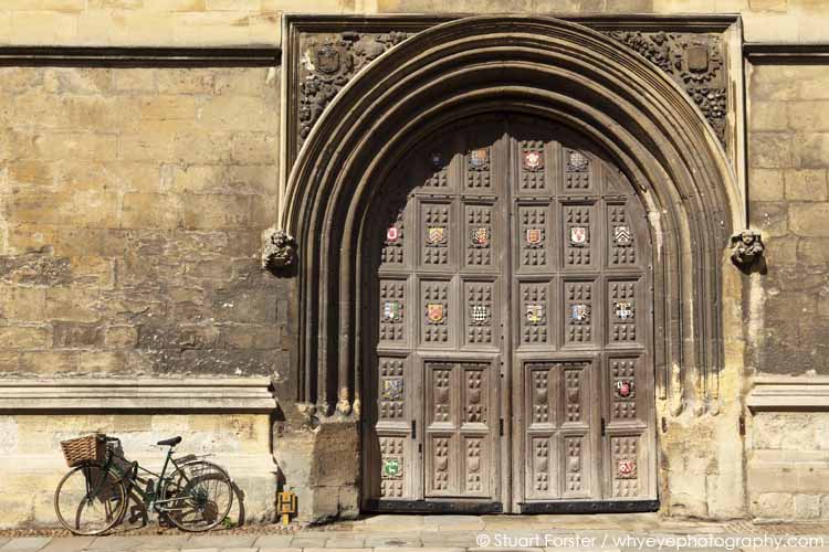 Bicycle stands by the closed gate of the Bodleian Library in Oxford, England