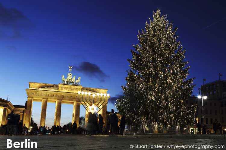 Christmas tree by the Brandenburg Gate in the blue hour in Berlin, Germany.