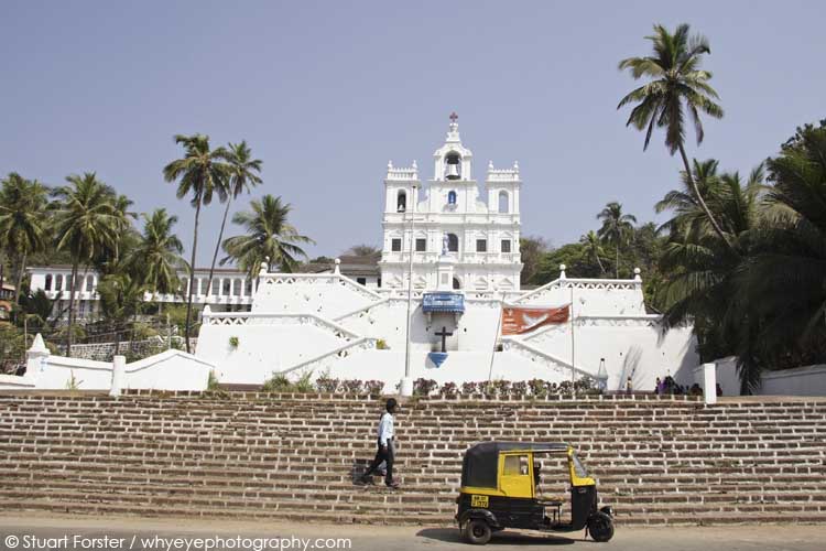 Rickshaw stands by steps below the Church of Immaculate Conception in Panaji (Panjim), Goa
