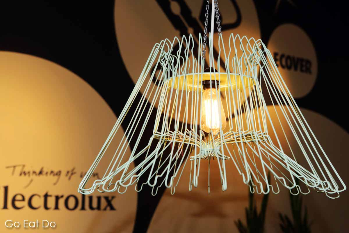 A designer lamp shade made using coat hangers in Wasbar cafe and wash salon in Ghent, Belgium