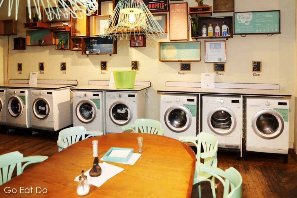 A row of washing machines at the Wasbar cafe and wash salon in Ghent, Belgium