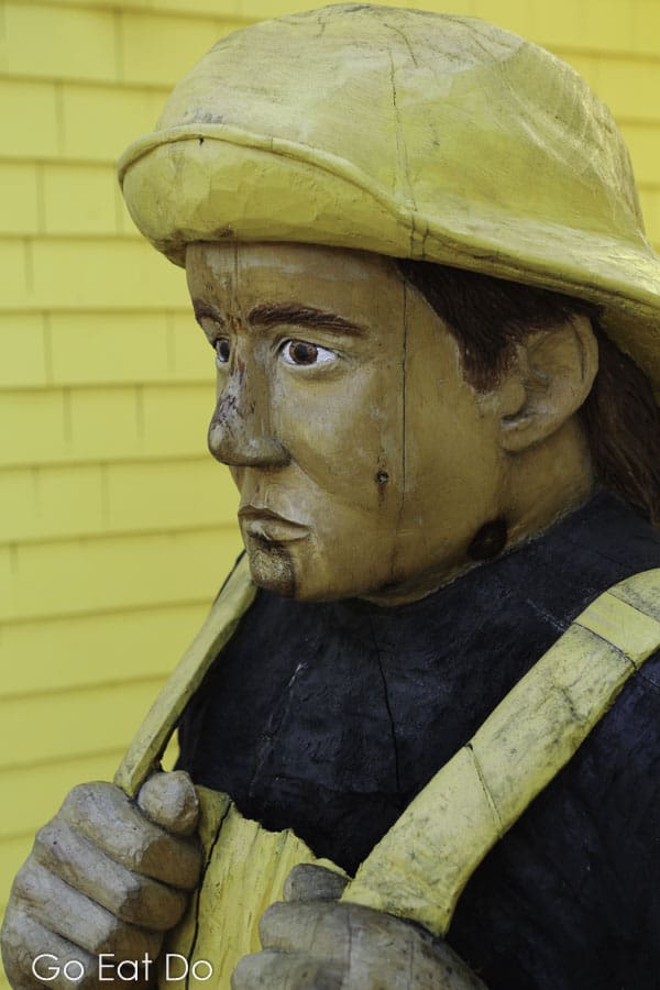 Figure of a fisherman wearing a souwester hat at Mahone Bay in Nova Scotia, Canada