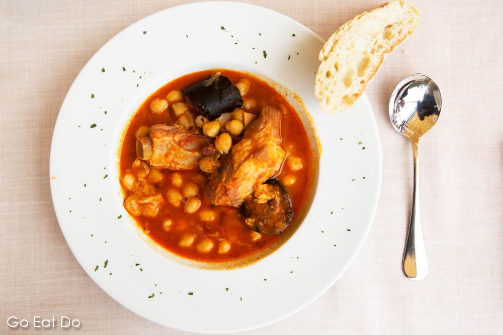 Sopa de garbanza stew, a traditional Canarian dish made with chickpeas and meat such as pork and black pudding. served in at one of the best restaurants in Tenerife