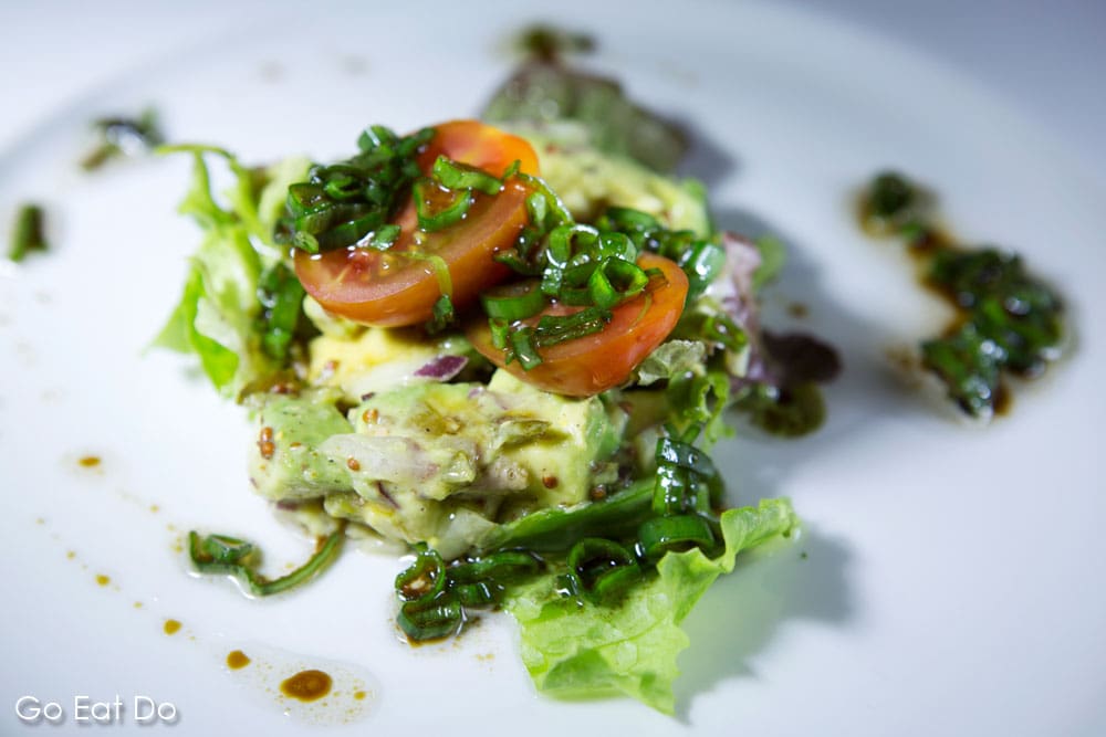 Looking for restaurants that serve vegetarian or vegan food in Tenerife? This dish features avocado served with cherry tomatoes