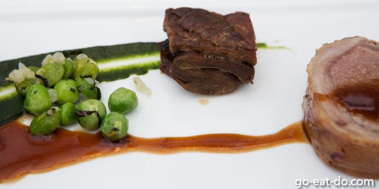 Peas and meat served as a main course during lunch at Dine on the Tyne in Gateshead, England