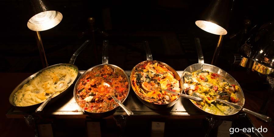 Some of the hot dishes served during brunch at the Waldorf Astoria hotel.