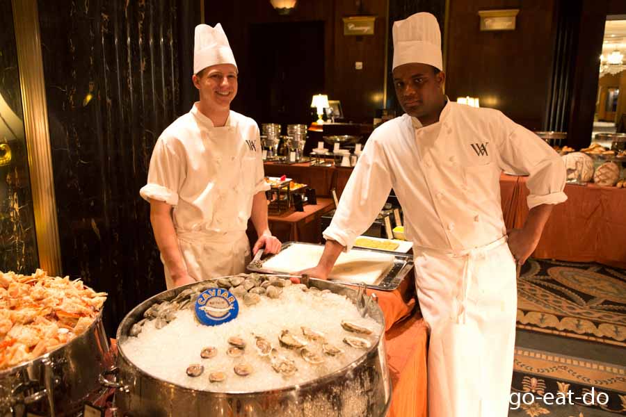 Chefs at the seafood bar during Sunday brunch at the Waldorf Astoria New York hotel