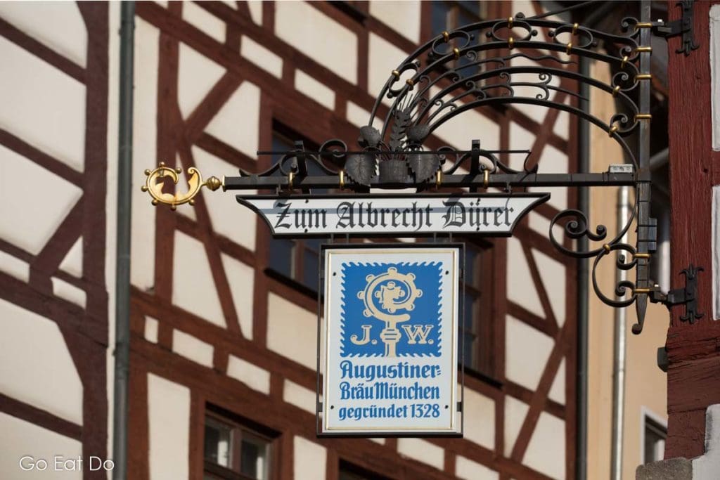 Sign for a pub serving beer brewed by the Augustiner Brewery which predates the Bavarian Purity Law.