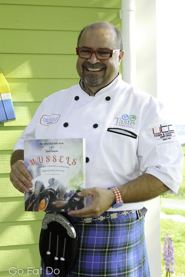 Alain Bossé, the Kilted Chef, with his cookbook 'Mussels'.
