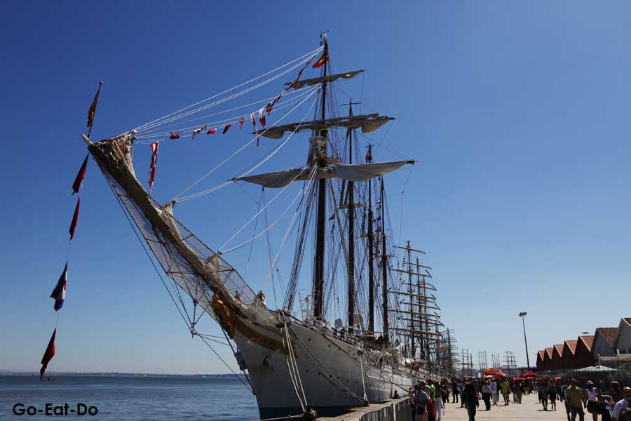 Tall ship under a blue sky docked during the North Sea Tall Ships Race at Blyth in Northumberland
