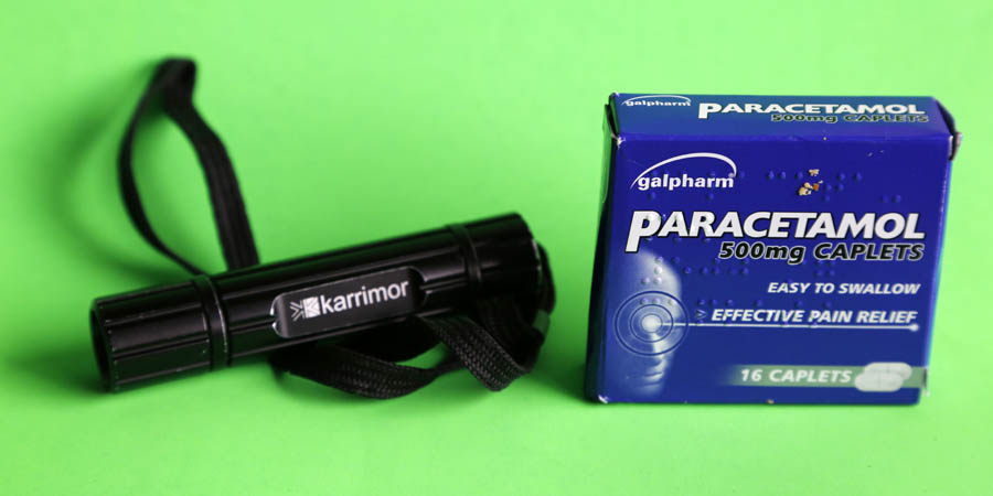 A torch and paracetamol tablets.