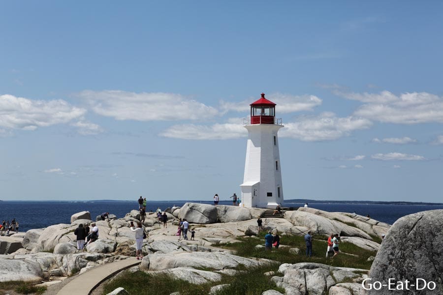 Peggy's Point Lighthouse on a sunny day at Peggy's Cove in Nova Scotia, Canada