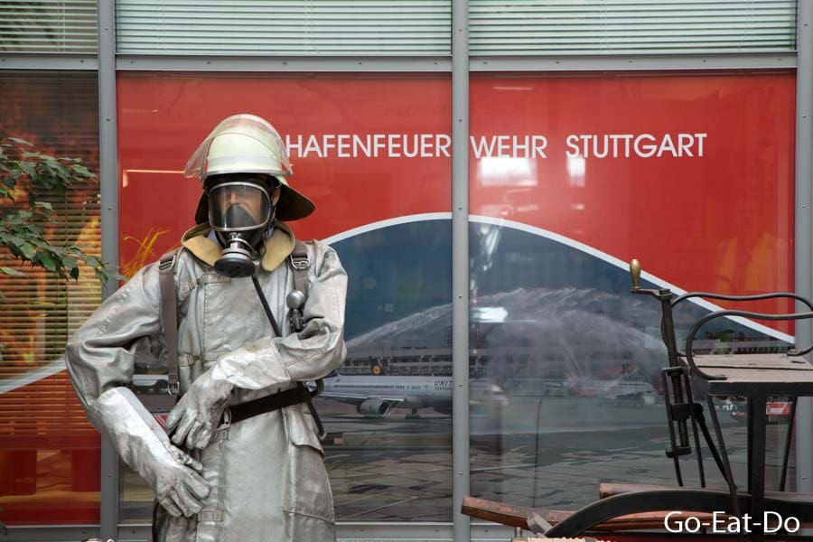 Firefighter wearing breathing apparatus, an exhibit in the lobby of Stuttgart Airport's fire station in Stuttgart, Germany