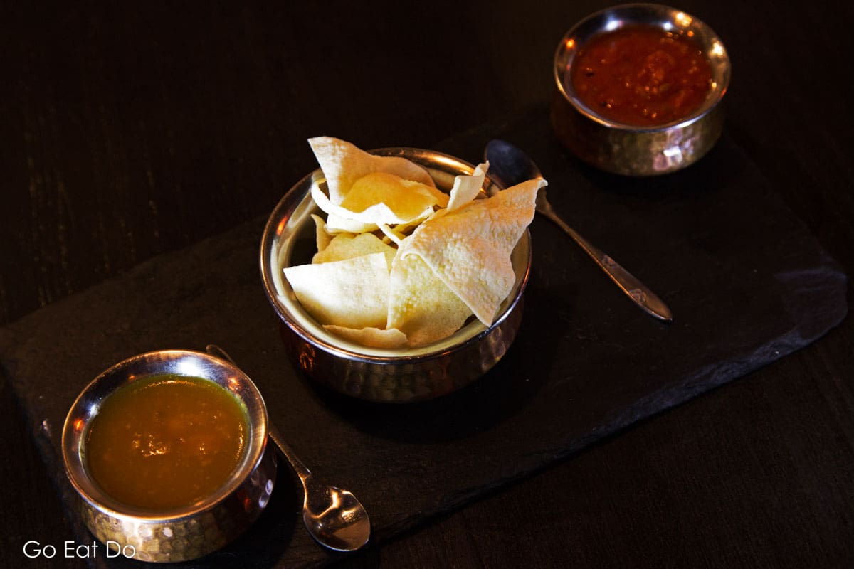 Poppadoms and pickles served at this modern Indian restaurant in Bristol's Clifton district