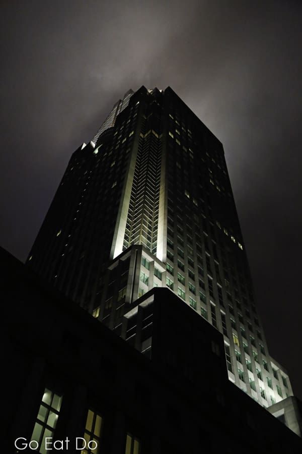 A skyscraper seen at night in downtown Montreal, Canada