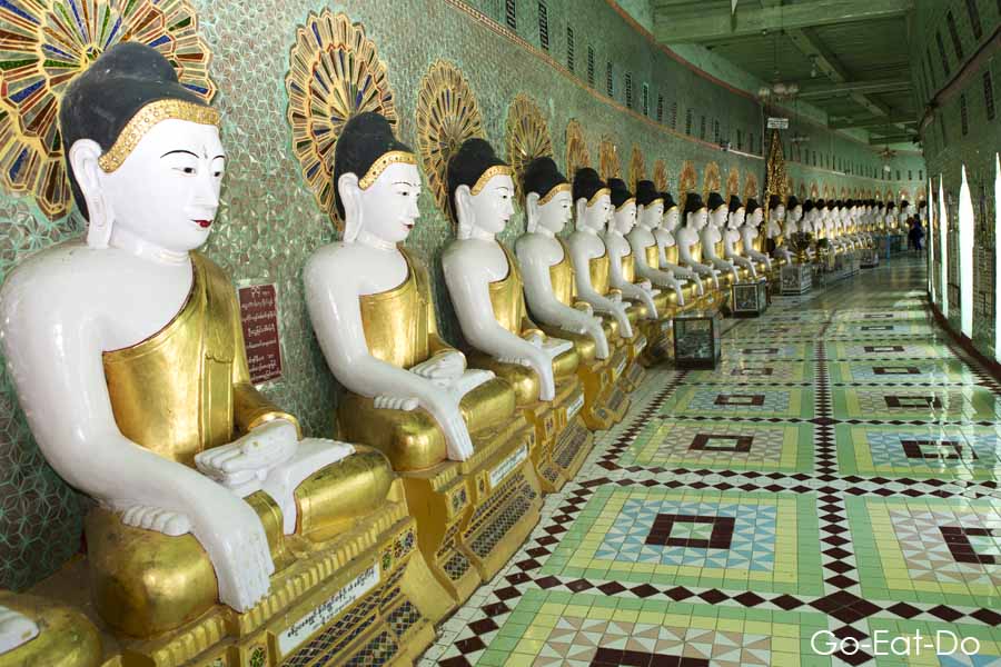 Row of Buddha statues in Myanmar (Burma)
