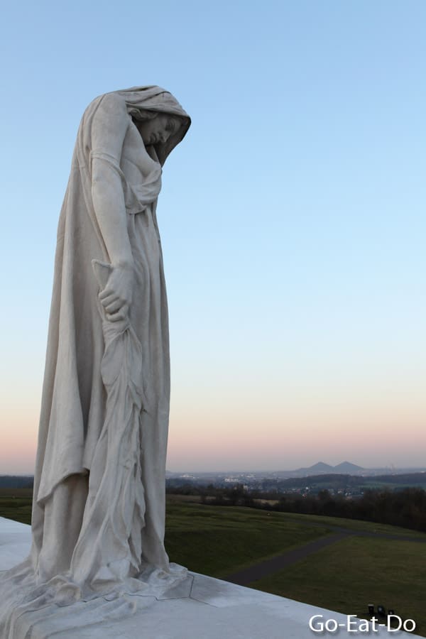 Sorrowful sculpture personifying grieving Canada by Walter Seymour Allward at Vimy Ridge National Historic Site of Canada in northern France