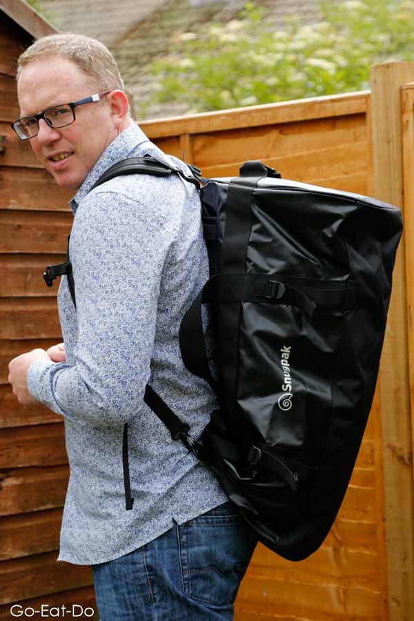 Snugpak Kitmonster 70 G2 bag on the back of travel writer Stuart Forster
