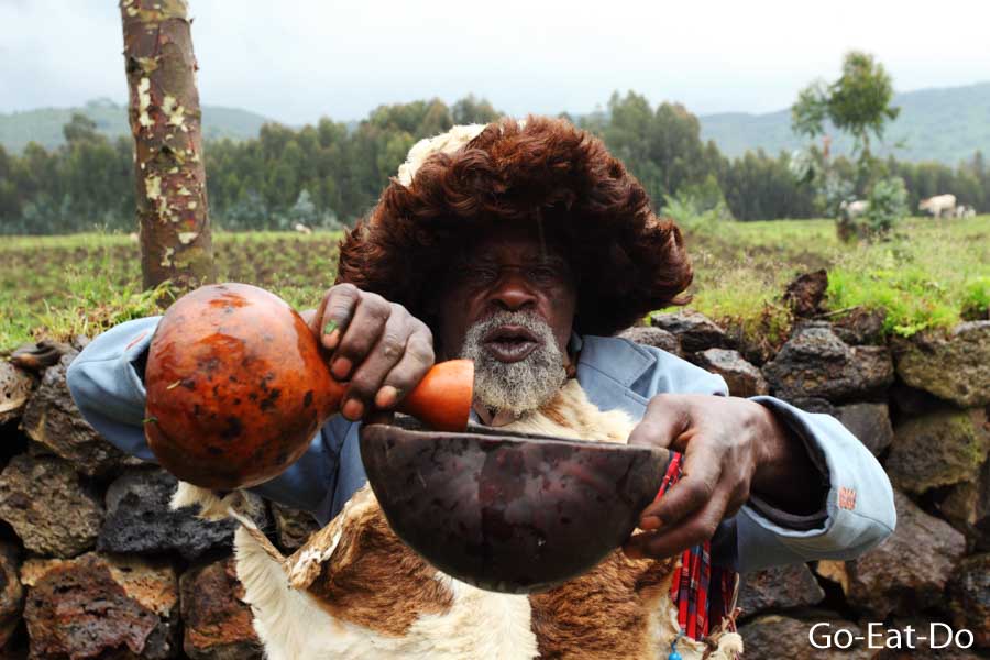 A medicine man gives a performance at the Iby'lwacu Cultural Village on the edge of the Volcanoes National Park.