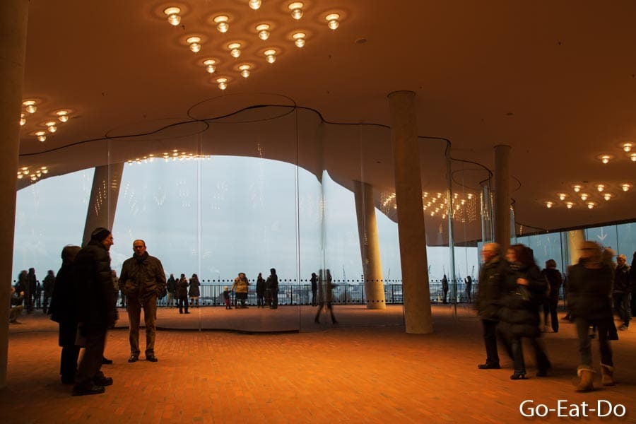 The curved windows within the public plaza of the Elbphilharmonie.