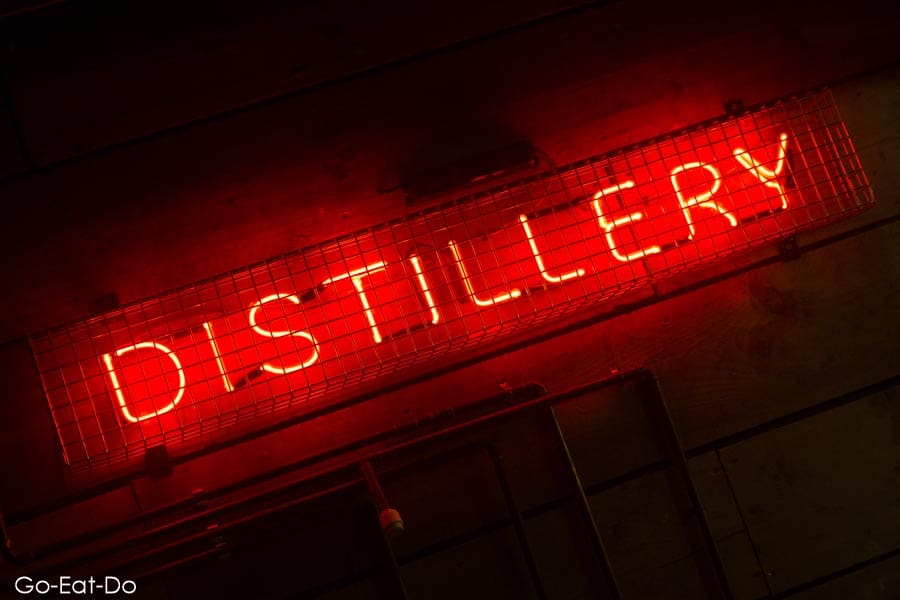 Neon distillery sign at Poetic License in Sunderland, England