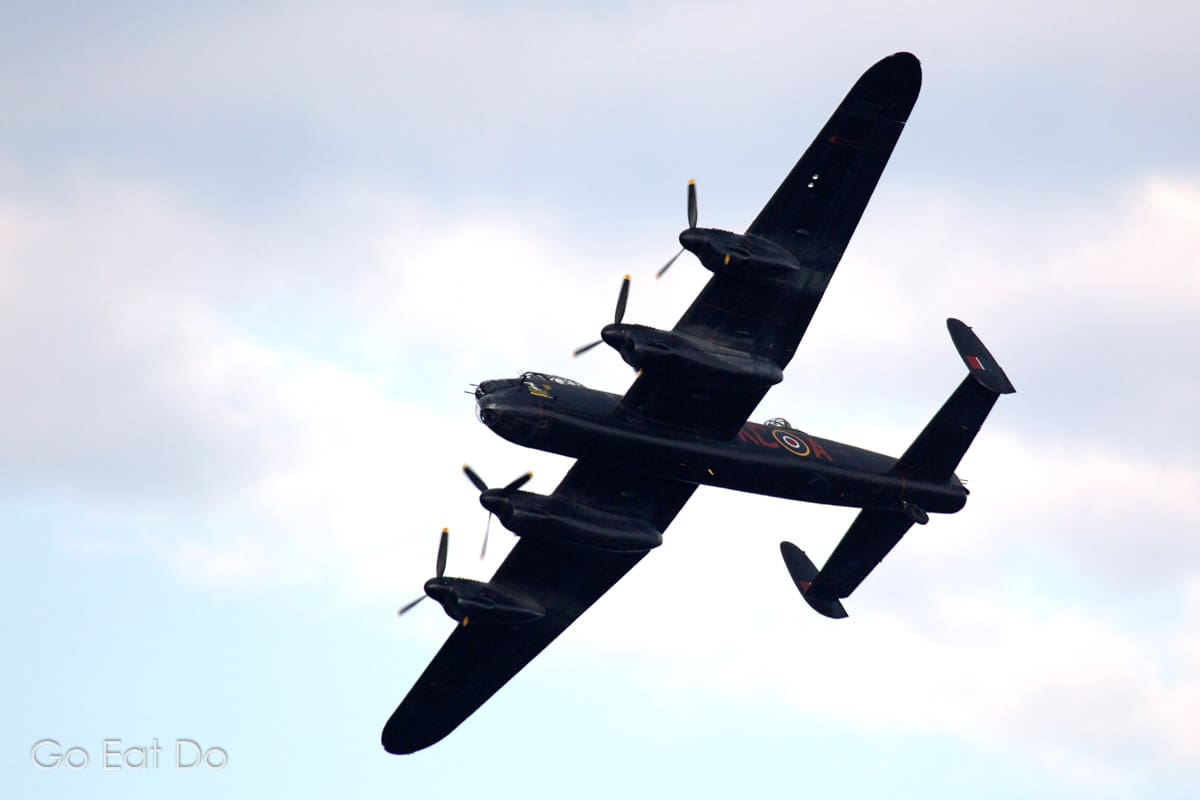 A Lancaster bomber flying as part of the RAF's Battle of Britain Memorial Flight.
