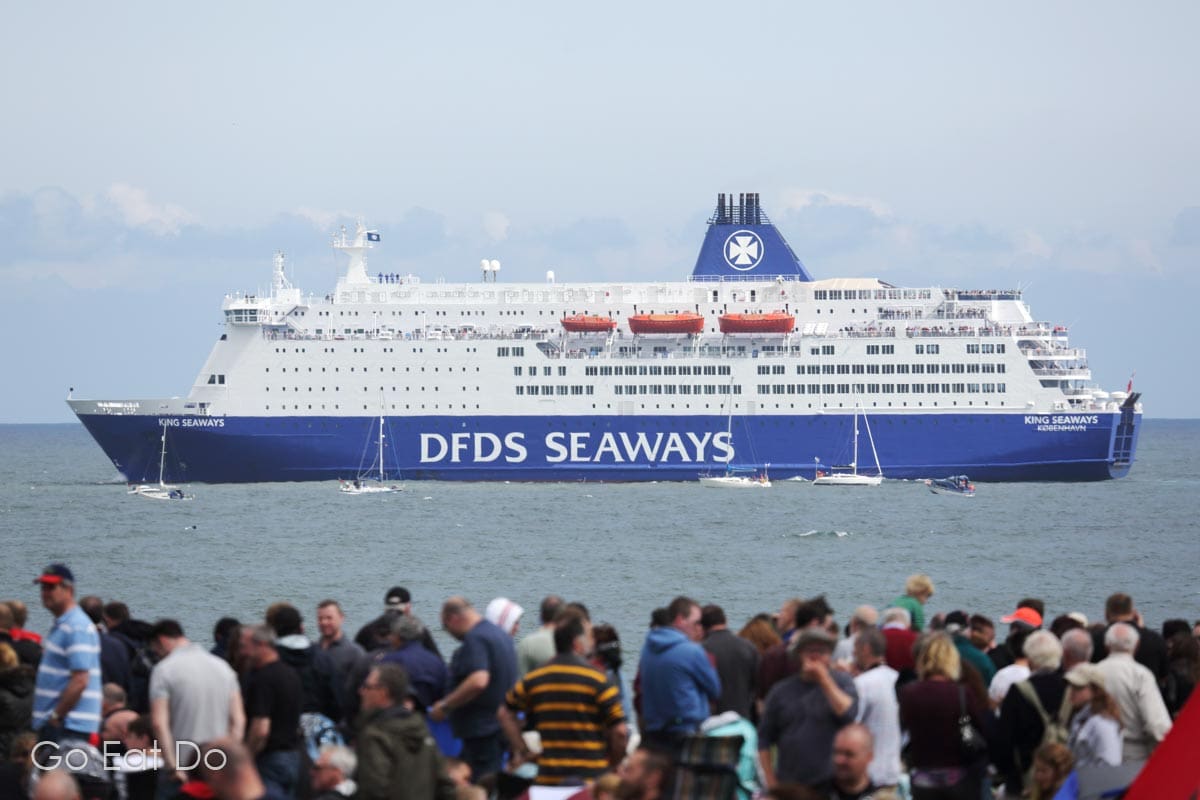 DFDS Seaways ferry in the North Sea watching the air show on a sunny day.