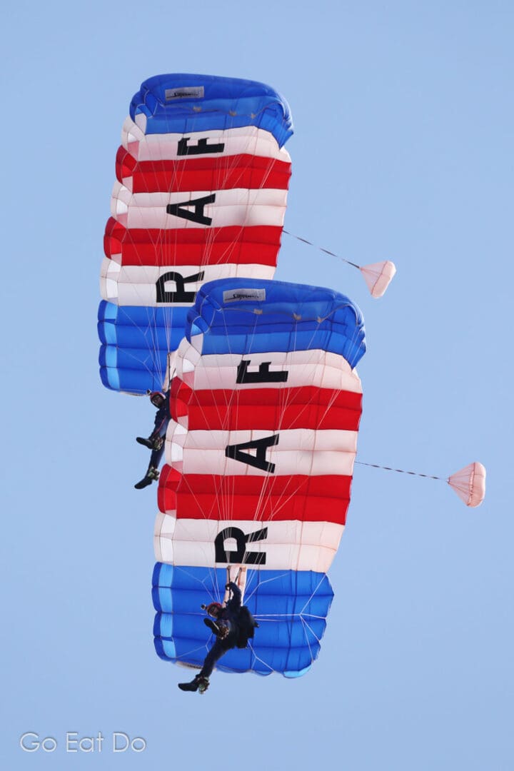 Members of the Raoyal Air Force's Falcons Parachute Display Team performing on a sunny day at Sunderland International Airshow.