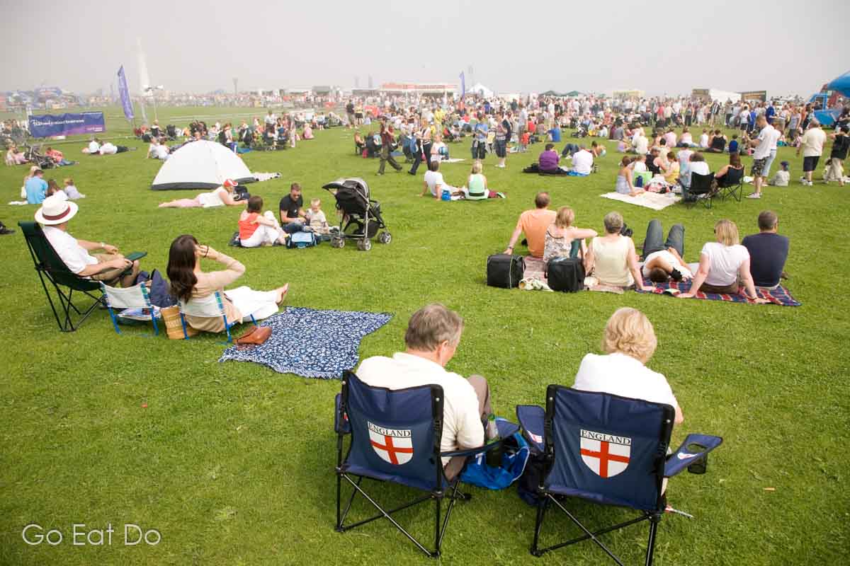 Folding chairs or picnic blankets prove useful things to bring to a summer airshow.